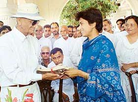 Kunwar Mohan Singh felicitates Kumari Selja, Minister of State for Urban Employment and Poverty Alleviation, at Ramgarh, near Panchkula
