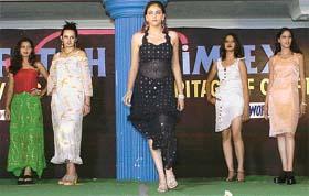 Models sashay down the ramp at a fashion show
