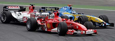 Ferrari's Formula One world champion Michael Schumacher of Germany leads BAR Honda driver Takuma Sato of Japan