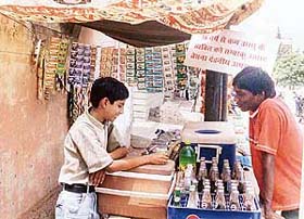 The Law is an ass: While it is illegal for a minor to buy tobacco products, a minor boy openly sells such items at a stall in Prem Nagar in Ludhiana