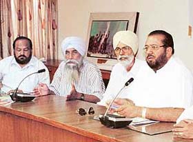 Mr Krishan Kumar Bawa, national president of the Bairagi Mahamandal, addresses a meeting of the office-bearers of the body in Ludhiana