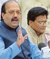 Mr Amar Singh, General Secretary of the Samajwadi Party, along with Mr Ram Gopal Yadav, Leader of the party�s parliamentary group, addresses a press conference in New Delhi on Monday. 