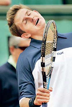 Igor Andreev of Russia reacts during his match against Gaston Gaudio of Argentina in the French Open in Paris
