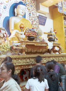 Devotees offer prayers at the main temple in McLeodganj, Dharamsala