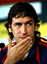 Spanish national football team captain Raul rubs his face during a news conference at the 'Ciudad del Futbol' grounds 