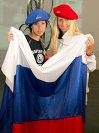 Anastasia Myskina (L) of Russia and compatriot Elena Dementieva pose during the French Open 