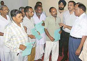 Vendors interact with the Director, Health Services, Dr CP Bansal, at an awareness camp on the maintenance of hygiene at the Health Centre, Sector 22, in Chandigarh