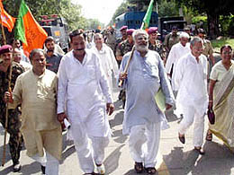 Haryana BJP leaders march to Raj Bhavan to submit a memorandum to the Governor in Chandigarh on Sunday, demanding dismissal of the INLD Government.
