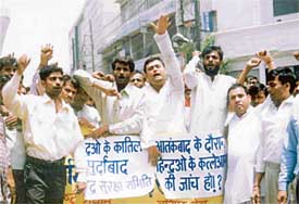 Members of the Akhil Bharatiya Hindu Suraksha Samiti hold a protest march on the anniversary of Operation Bluestar