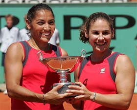 Virginia Ruano Pascual and Paola Suarez of Argentina display their trophy