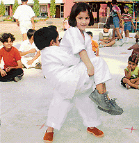 Children learn the techniques of self defence at the summer sports workshop organised on the premises of KB DAV Centenary School, Sector 7.