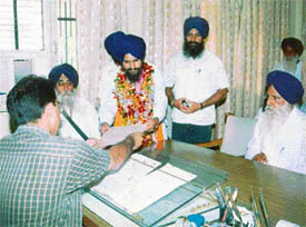 Mr Ravinder Singh Khalsa, SAD (A) candidate for the SGPC election from the Amloh constituency, files his nomination papers at the SDM�s office