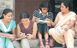 Admission seekers taking help from their parents before submitting their forms at St. Stephen�s College.