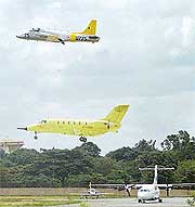 Civilian aircraft Saras (flying below) along with an AIF aircraft makes its second flight. 