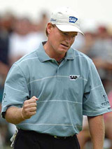 Ernie Els of Johannesburg, South Africa, pumps his fist after a par putt on the 16th hole during the final round of the Memorial Tournament at Muirfield Village Golf Club in Dublin, Ohio