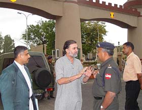 Tarun Tejpal of tehelka.com discusses a point with prosecution counsel Arvind Moudgil and the prosecuting officer, Major S. Sidhanshu, on his arrival to depose before a general court martial trying a colonel for impropriety, in Chandimandir