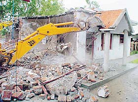 An unauthorised is razed at Khuda Ali Sher in Chandigarh