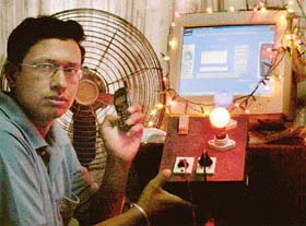 Vikrant Bains, MCA IInd year student from Panjab University, demonstrates the prototype of Mobile Controlled Automation System