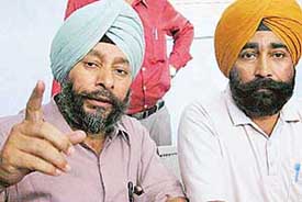 Mr B. S. Bedi, general secretary, Punjab School Education Board Employees Association, addresses a press conference in SAS Nagar