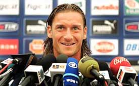 Italian striker Francesco Toti smiles during a news conference prior to a training session in Lisbon