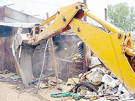 Illegal buildings which had come up on acquired lands in village Hallo Majra located near the Industrial Area Phase II were demolished on Friday.