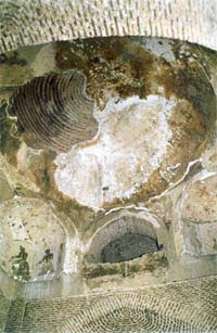 The faded carvings on the ceiling of the Mughal Sarai