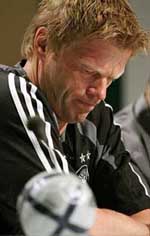 Oliver Kahn, goalkeeper and team captain of the German national soccer team, frowns during a news conference in Almancil near Faro