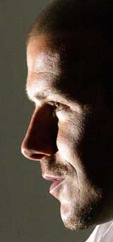 England's David Beckham speaks during a news conference