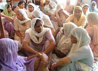Aggrieved relatives of victims of murder and robbery in Mullanpur on Wednesday. 