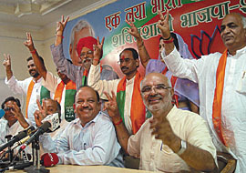 BJP leaders Sahib Singh Verma, Dr Harshvardhan, Mr Vijay Goel and Mr Lal Bihari Tiwari with party candidates for the MCD byelection at a press conference in the Capital on Thursday