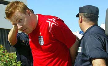 The Portuguese police escorts a soccer fan