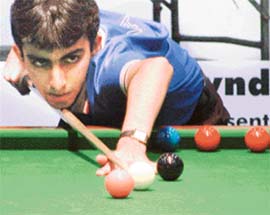 Pankaj Advani of India plays a shot during the Indo-Pak Peace Cup Snooker Tournament in Chandigarh on Friday. 