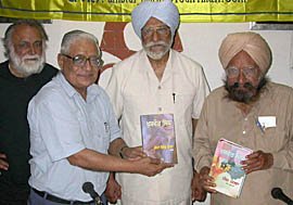 Mr H.K. Dua, Editor-in-Chief of The Tribune, unveils Punjabi translations of Khushwant Singh�s autobiography and novel at the Press Club in Chandigarh on Saturday. Also seen in the picture are Khushwant Singh�s son Rahul Singh (extreme left) and former Governor of Kerala Justice S.S Kang. 