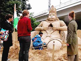 Indian sand sculptor Sudarshan Pattanaik from Orissa works on his model during the second international sand sculpture competition in Berlin 