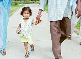 God is in the heaven and all is well with this little one’s world, as she treads in the safe hands of her father