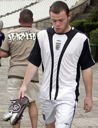 Wayne Rooney arrives for a training session