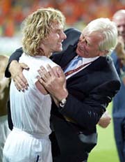 The Czech Republic's Pavel Nedved  is embraced by coach Karel Bruckner