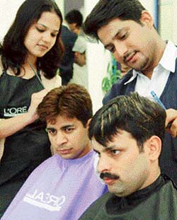 Men undergo colouring on hair at Tress Lounge in Chandigarh