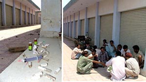 Syringes and bottles of drugs lying in the PUDA shopping complex at Malout and persons gambling in the PUDA shopping complex at Malout
