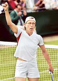 Martina Navratilova of the USA celebrates her victory over Catalina Castano of Colombia in their first round match at Wimbledon
