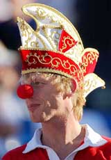 A soccer fan with an elaborate hat