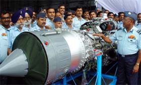 Air Marshal D. C. Nigam inspects the 500th AN-32 aircraft engine