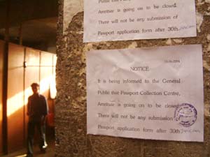 A public notice informing the closure of passport collection centre has been put up outside the centre building in Amritsar. 