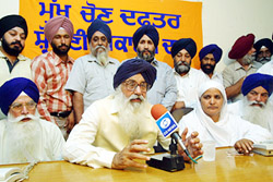 Former Chief Minister Parkash Singh Badal talks to mediapersons after inaugurating the Shiromani Akali Dal�s election office in Jalandhar on Tuesday