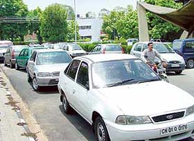 Haphazardly parked cars at the Administrative Block of Panjab University