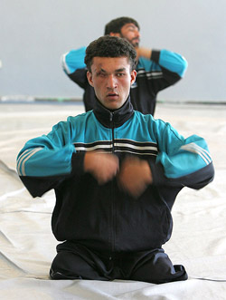 Disabled Afghani men warm up at an indoor club in Kabul on Wednesday