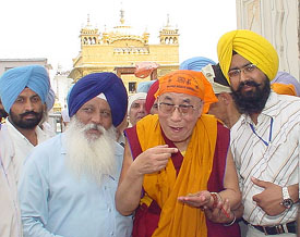 Tibetan spiritual leader the Dalai Lama comes out of Harmandar Sahib after paying obeisance on the occasion of the 400th anniversary celebrations of the installation of Guru Granth Sahib at Golden Temple in Amritsar on Wednesday. 