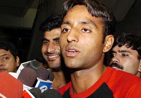 Hockey player Gagan Ajit Singh talks to mediapersons on his arrival at IGI airport in New Delhi on Tuesday