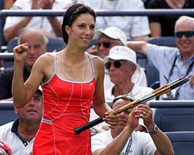 Anastasia Myskina of Russia celebrates her win over Ludmila Cervanova of Slovakia during their match 