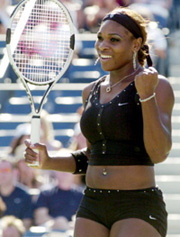 Serena Williams of the USA celebrates her win over compatriot Lindsay Lee-Waters during their match at the US Open